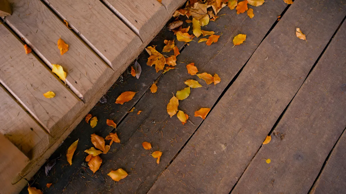 Fall leaves clogging residential gutters